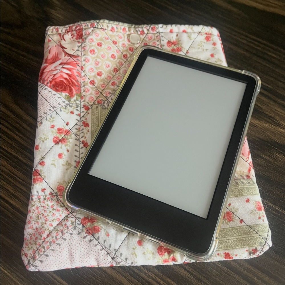 Quilted embroidered pearl snap kindle/E reader sleeve.